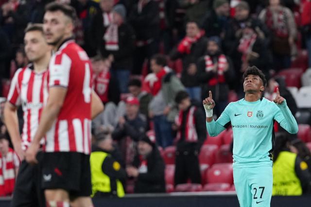 Sporting Lisbon's Brazilian forward #27 Alisson Santos celebrates victory at the end of the UEFA Champions League league phase day 8 football match between Athletic Club Bilbao and Sporting CP at San Mames Stadium in Bilbao on January 28, 2026. (Photo by Cesar MANSO / AFP)