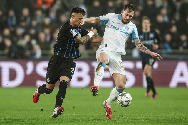 Club Brugge's Serbian midfielder #25 Aleksandar Stankovi? (L)  fights for the ball with Marseille's Danish midfielder #23 Pierre-Emile Hojbjerg during the UEFA Champions League, league phase day 8, football match between Club Brugge KV and Olympique de Marseille, at the Jan Breydel Stadium in Bruges on January 28, 2026. (Photo by BRUNO FAHY / BELGA / AFP) / Belgium OUT