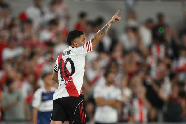 River Plate's Colombian midfielder #10 Juan Fernando Quintero celebrates scoring his team's second goal during the Argentine Professional Football League 2026 Apertura Tournament match between River Plate and Gimnasia y Esgrima La Plata at the Mas Monumental Stadium in Buenos Aires on January 28, 2026. (Photo by Luis ROBAYO / AFP)