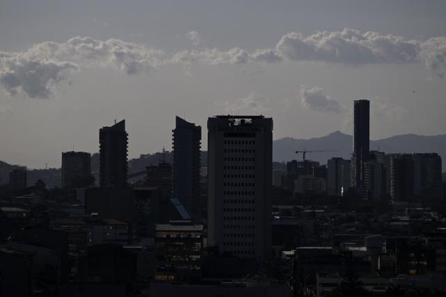 Buildings are pictured in San Jose on January 28, 2026. Right-wing politician Laura Fernandez appears set to win Costa Rica's presidential election in the first round, according to two opinion polls published on January 21. (Photo by Marvin RECINOS / AFP)