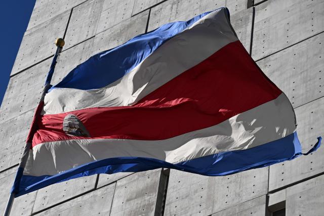 A Costa Rica’s flag flutters at the Legislative Assembly in San Jose on January 28, 2026. Right-wing politician Laura Fernandez appears set to win Costa Rica's presidential election in the first round, according to two opinion polls published on January 21. (Photo by Marvin RECINOS / AFP)