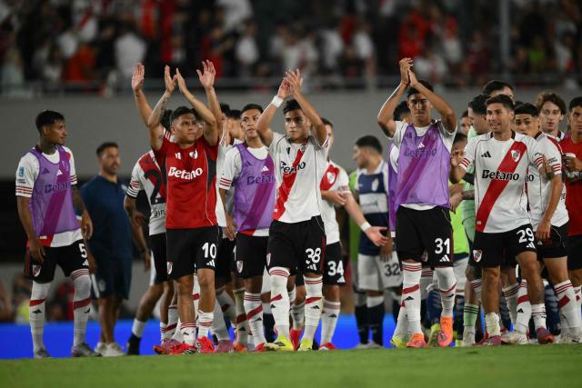River Plate’s players greet the fans at the end of the Argentine Professional Football League 2026 Apertura Tournament match between River Plate and Gimnasia y Esgrima La Plata at the Mas Monumental Stadium in Buenos Aires on January 28, 2026. (Photo by Luis ROBAYO / AFP)