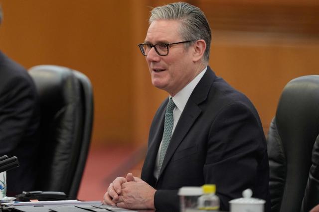 Britain's Prime Minister Keir Starmer speaks during a meeting with China's President Xi Jinping at the Great Hall of the People in Beijing on January 29, 2026. Starmer met with China's leader Xi Jinping in Beijing on January 29, state news agency Xinhua reported, with talks expected to  cover trade ties, national security and human rights. (Photo by Vincent Thian / POOL / AFP)