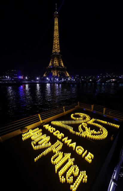 This photograph shows a celebration of the 25th anniversary of the Harry Potter movie franchise in front of the Eiffel Tower, in Paris on January 28, 2026. (Photo by STEPHANE DE SAKUTIN / AFP)