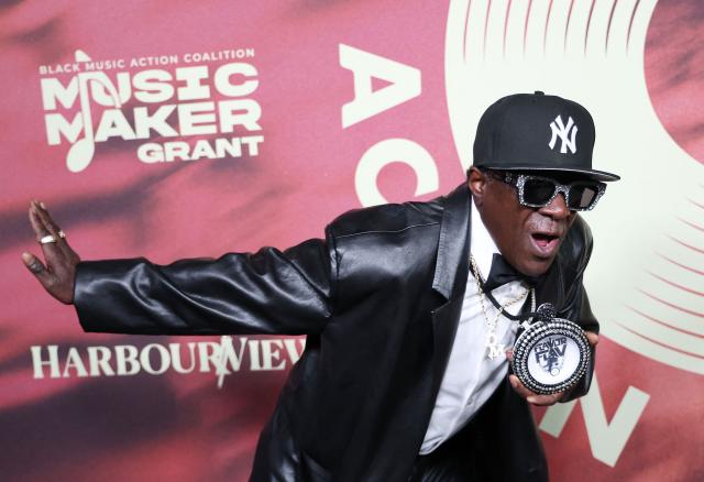 US rapper Flavor Flav attends the Black Music Action Coalition's (BMAC) Music Maker Dinner in Los Angeles on January 28, 2026. (Photo by Michael Tran / AFP)