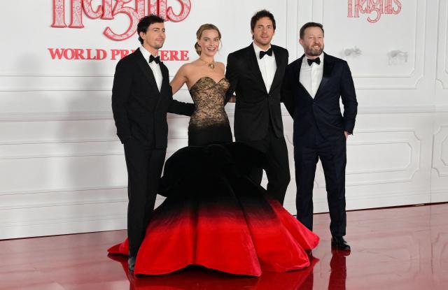 (L/R) Producer Joseph McNamara, Australian actress Margot Robie and executive producer Tom Ackerley attend the world premiere of "Wuthering Heights" at the TCL Chinese Theatre in Los Angeles on January 28, 2026. (Photo by Frederic J. BROWN / AFP)