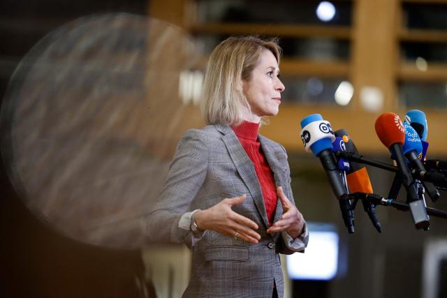 EU High Representative and Vice-President for Foreign Affairs and Security Policy Kaja Kallas talks to journalists upon arrival for a Foreign Affairs Council meeting in Brussels on January 29, 2026. The Council is expected to discuss the latest developments in Ukraine with discussions focused on peace negotiations, support for Ukraine and pressure on Russia. (Photo by SIMON WOHLFAHRT / AFP)