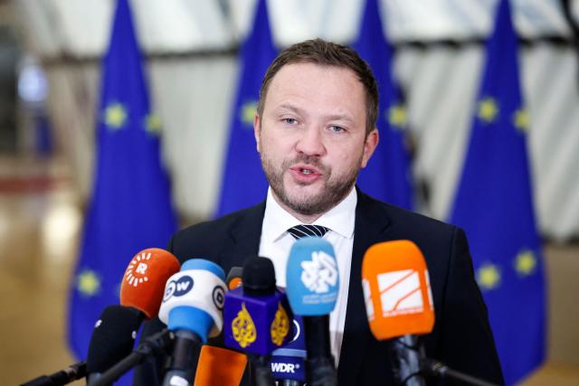 Estonia's Foreign Minister Margus Tsahkna talks to journalists upon arrival for a EU Foreign Affairs Council meeting at the EU headquarters in Brussels on January 29, 2026. The Council is expected to discuss the latest developments in Ukraine with discussions focused on peace negotiations, support for Ukraine and pressure on Russia. (Photo by SIMON WOHLFAHRT / AFP)