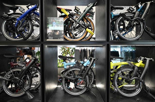 This picture shows British Brompton folding bicycle at a shop in Beijing on January 29, 2026. (Photo by Adek BERRY / AFP)