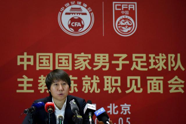 (FILES) Li Tie, the new head coach of China men's national football team, speaks during a press conference in Beijing on January 5, 2020. China's football association issued lifetime bans to 73 people, including former national team head coach Li Tie, and punished 13 top professional clubs for match-fixing and corruption, it said on January 29, 2026. (Photo by WANG ZHAO / AFP)