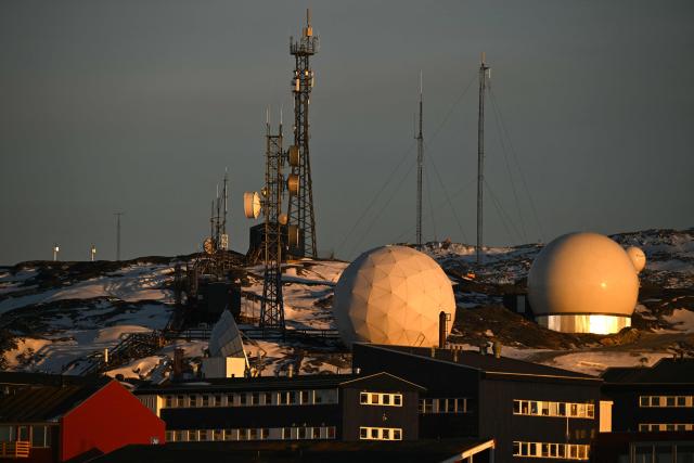 Satellite systems are pictured in the city of Nuuk, western Greenland, on January 28, 2026. (Photo by Ina FASSBENDER / AFP)