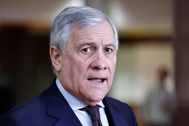 Italy's Foreign Minister Antonio Tajani talks to journalists upon arrival for a EU Foreign Affairs Council meeting at the EU headquarters in Brussels on January 29, 2026. The Council is expected to discuss the latest developments in Russia’s invasion in Ukraine with discussions focusing on peace negotiations, support for Ukraine and pressure on Russia. (Photo by SIMON WOHLFAHRT / AFP)