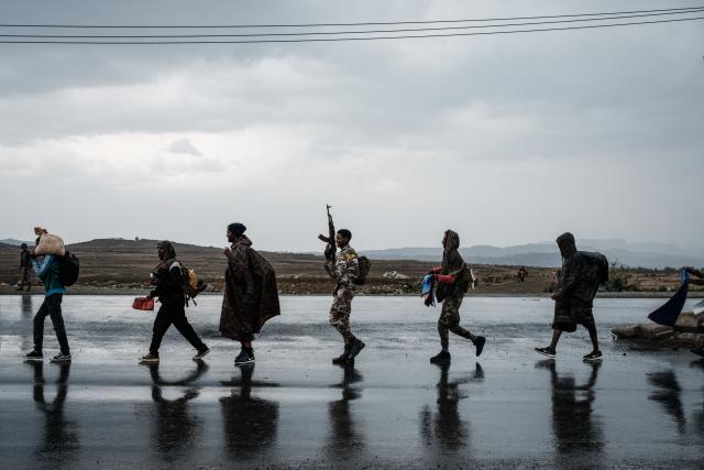 (FILES) Tigray People's Liberation Front (TPLF) fighters walk in lines towards another field in Mekele, the capital of Tigray region, Ethiopia, on June 30, 2021. Clashes between federal and Tigrayan forces have erupted in Ethiopia's northern Tigray region, prompting the suspension of flights, security and diplomatic sources told AFP on January 29, 2026.
Hostilities broke out in Tsemlet, western Tigray, an area claimed by forces from the neighbouring Amhara region, the sources told AFP on condition of anonymity. (Photo by Yasuyoshi Chiba / AFP)