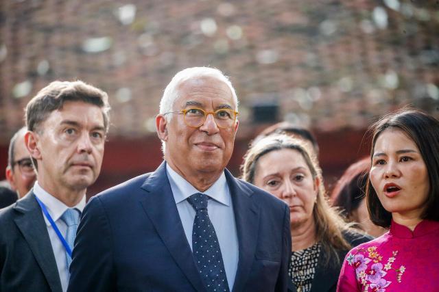 European Council President Antonio Costa (C) visits the Temple of Literature in Hanoi on January 29, 2026 during his visit to Vietnam. (Photo by LUONG THAI LINH / POOL / AFP)
