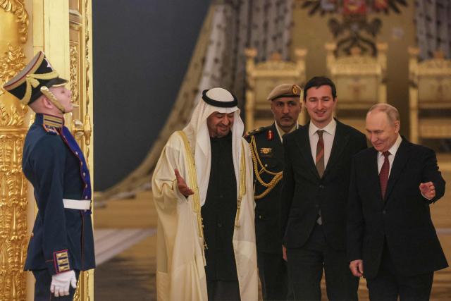 Russian President Vladimir Putin welcomes UAE President Sheikh Mohamed bin Zayed al-Nahyan during their meeting at the Kremlin in Moscow on January 29, 2026. (Photo by MAXIM SHIPENKOV / POOL / AFP)