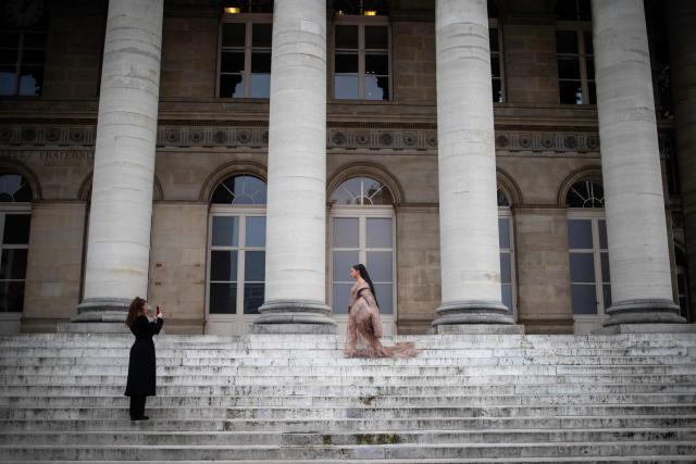 French internet personality Lena Situations arrives at the Palais Brongniart to attend the Ashi Studio Women's Haute Couture Spring/Summer 2026 collection fashion show as part of the Paris Haute Couture Fashion Week, in Paris, on January 29, 2026. (Photo by Guillaume BAPTISTE / AFP)