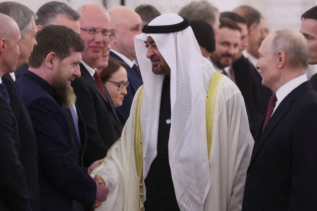 UAE President Sheikh Mohamed bin Zayed al-Nahyan, flanked by Russian President Vladimir Putin, greets Chechen leader Ramzan Kadyrov during their meeting at the Kremlin in Moscow on January 29, 2026. (Photo by MAXIM SHIPENKOV / POOL / AFP)