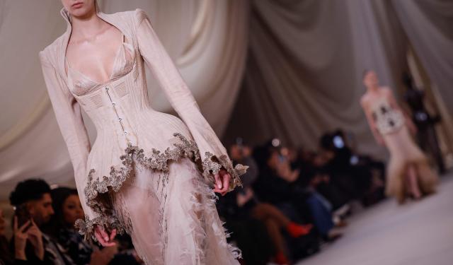 A model presents a creation for Ashi Studio for the Women's Haute Couture Spring/Summer 2026 collection fashion show as part of the Paris Haute Couture Fashion Week, in Paris, on January 29, 2026. (Photo by Ian LANGSDON / AFP)