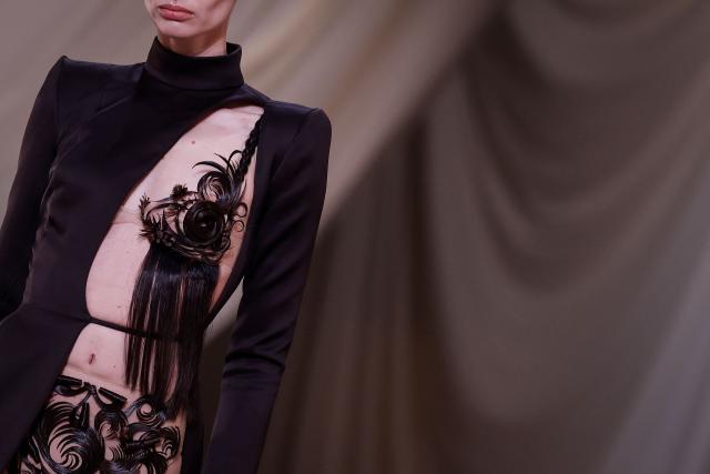 EDITORS NOTE: Graphic content / A model presents a creation for Ashi Studio for the Women's Haute Couture Spring/Summer 2026 collection fashion show as part of the Paris Haute Couture Fashion Week, in Paris, on January 29, 2026. (Photo by Ian LANGSDON / AFP)