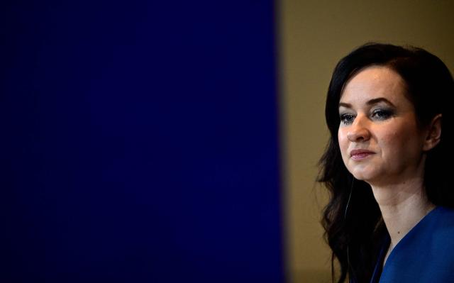 Lithuania's Prime Minister Inga Ruginiene and the German Chancellor (not in picture) address a joint press conference at the Chancellery in Berlin, Germany, on January 29, 2026. (Photo by Tobias SCHWARZ / AFP)