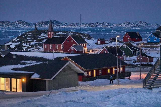 A church can be seen at the coastline as the sea is covered with sheets of ice in Nuuk, Greenland, on January 29, 2026. (Photo by Ina FASSBENDER / AFP)
