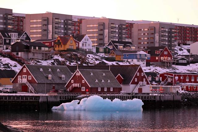 An ice block is seen floating in the harbour in Nuuk, Greenland, on January 29, 2026. (Photo by Ina FASSBENDER / AFP)