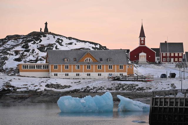 An ice block swims in the water in the city of Nuuk, western Greenland, on January 29, 2026. (Photo by Ina FASSBENDER / AFP)