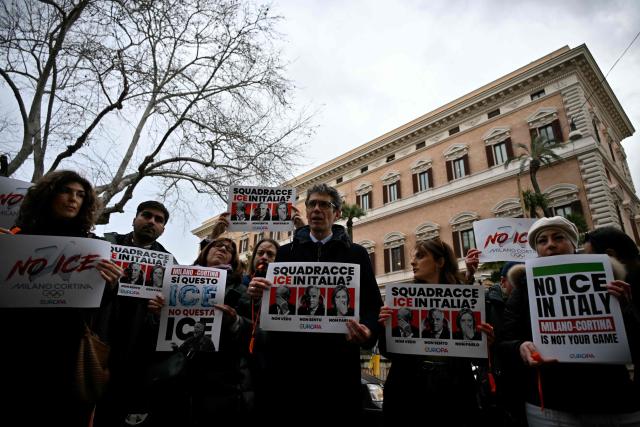 More Europe secretary Riccardo Magi (C) attends a flash mob to protest against US Immigration and Customs Enforcement (ICE), in front of US embassy in Rome on January 29, 2026. A branch of the US Immigration and Customs Enforcement (ICE) will help support security operations for the Winter Olympics in Italy, sparking consternation and warnings they were not welcome. (Photo by Filippo MONTEFORTE / AFP)