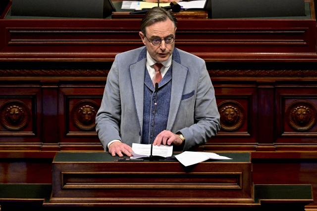 Belgium's Prime Minister Bart De Wever delivers a speech during a plenary session of the Chamber at the Federal Parliament in Brussels on January 29, 2026. (Photo by DIRK WAEM / Belga / AFP) / Belgium OUT