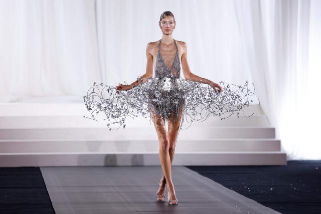 A model presents a creation by Celia Kritharioti for the Women's Haute Couture Spring/Summer 2026 collection fashion show as part of the Paris Haute Couture Fashion Week, in Paris, on January 29, 2026. (Photo by Ian LANGSDON / AFP)