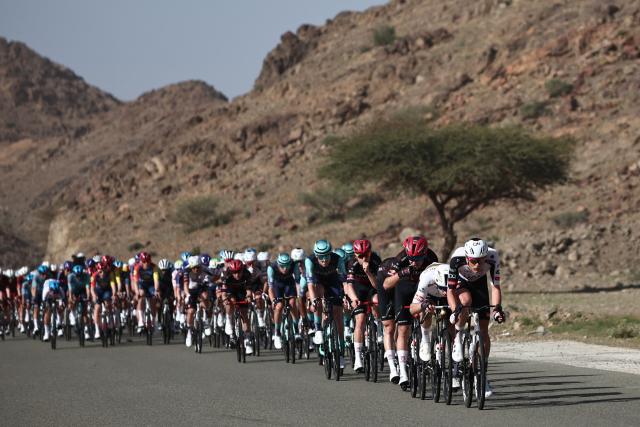 The pack rides during the third stage of the AlUla Tour cycling race, 142.1km from Winter Park to Bir Jaydah Mountain Wirkah on January 29, 2026. (Photo by Anne-Christine POUJOULAT / AFP)