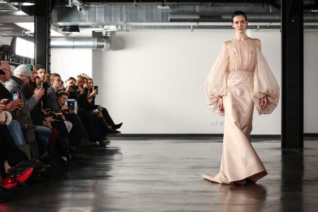 A model presents a creation by Rami Al Ali for the Women's Haute Couture Spring/Summer 2026 collection fashion show as part of the Paris Haute Couture Fashion Week, in Paris, on January 29, 2026. (Photo by Thomas SAMSON / AFP)