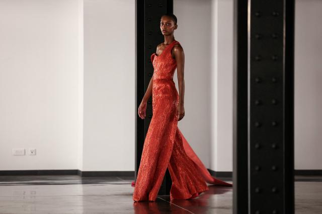A model presents a creation by Rami Al Ali for the Women's Haute Couture Spring/Summer 2026 collection fashion show as part of the Paris Haute Couture Fashion Week, in Paris, on January 29, 2026. (Photo by Thomas SAMSON / AFP)