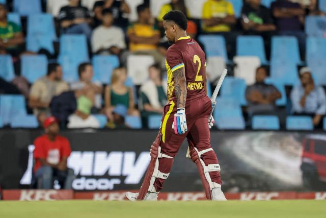 West Indies' Shimron Hetmyer walks back to the pavilion after his dismissal during the second Twenty20 international cricket match between South Africa and West Indies at SuperSport Park in Centurion on January 29, 2026. (Photo by PHILL MAGAKOE / AFP)
