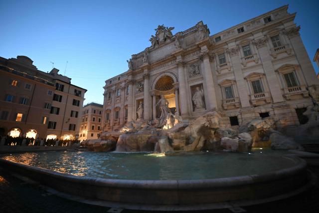 A picture shows the Trevi Fountain at night, in Rome on January 29, 2026. (Photo by Filippo MONTEFORTE / AFP)