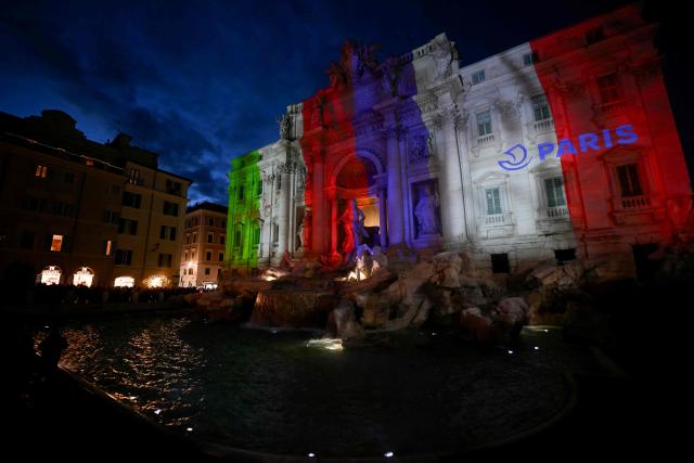 The French and Italian flags are projected onto the Trevi Fountain to commemorate 70 years of Rome-Paris twinning, in Rome on January 29, 2026. (Photo by Filippo MONTEFORTE / AFP)