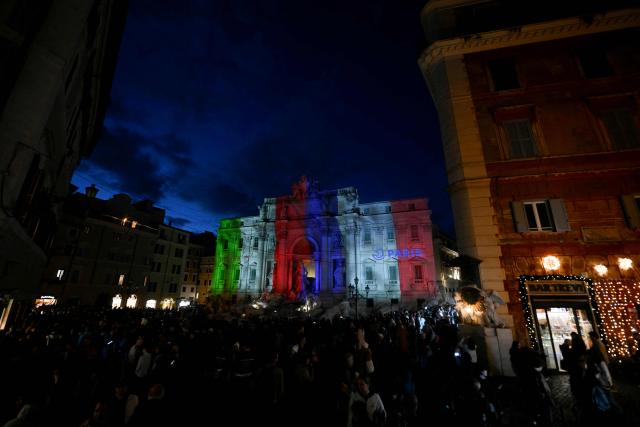 The French and Italian flags are projected onto the Trevi Fountain to commemorate 70 years of Rome-Paris twinning, in Rome on January 29, 2026. (Photo by Filippo MONTEFORTE / AFP)