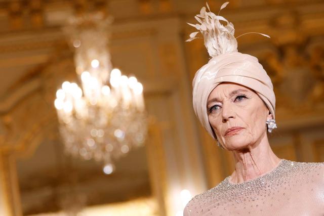 A model presents a creation for Miss Sohee for the Women's Haute Couture Spring/Summer 2026 collection fashion show as part of the Paris Haute Couture Fashion Week, in Paris, on January 29, 2026. (Photo by Ian LANGSDON / AFP)
