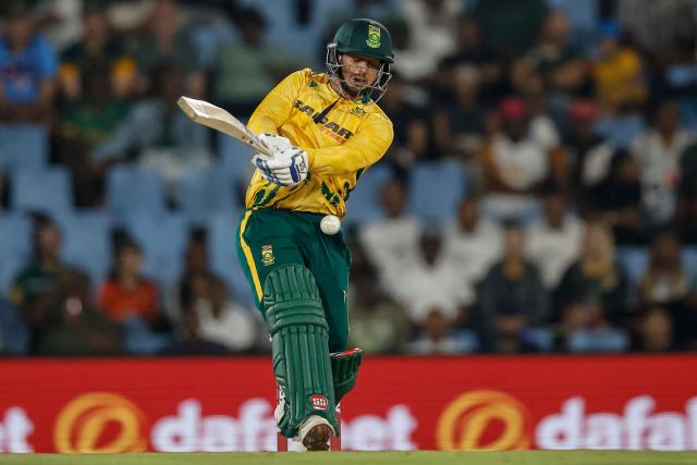 South Africa's Quinton de Kock reacts as he is hit by the ball from a delivery by West Indies' Matthew Forde during the second Twenty20 international cricket match between South Africa and West Indies at SuperSport Park in Centurion on January 29, 2026. (Photo by PHILL MAGAKOE / AFP)