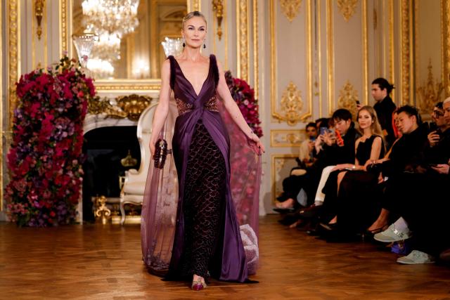 A model presents a creation for Miss Sohee for the Women's Haute Couture Spring/Summer 2026 collection fashion show as part of the Paris Haute Couture Fashion Week, in Paris, on January 29, 2026. (Photo by Ian LANGSDON / AFP)
