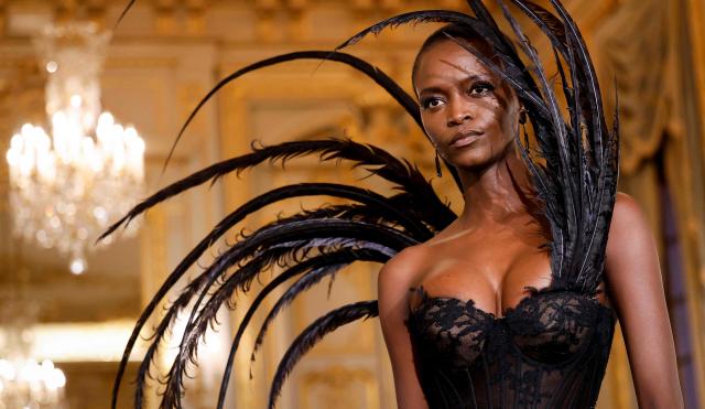 A model presents a creation for Miss Sohee for the Women's Haute Couture Spring/Summer 2026 collection fashion show as part of the Paris Haute Couture Fashion Week, in Paris, on January 29, 2026. (Photo by Ian LANGSDON / AFP)