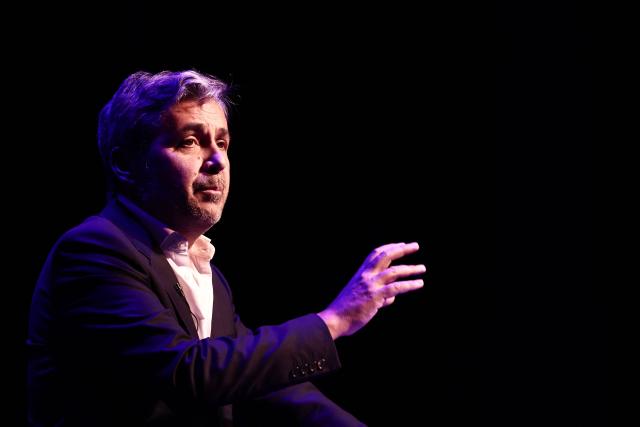 French former journalist Olivier Galzi, candidate for the city hall of Avignon, delivers a speech during his first campaign rally for France's upcoming municipal elections in Avignon, southern France, on January 29, 2026. French voters head to the polls for municipal elections on March 15 and 22, 2026. (Photo by Thibaud MORITZ / AFP)