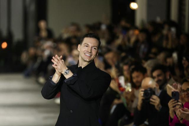 Swiss fashion designer Kevin Germanier acknowledges the audience at the end of Germanier Women's Haute Couture Spring/Summer 2026 collection fashion show as part of the Paris Haute Couture Fashion Week, in Paris, on January 29, 2026. (Photo by Thomas SAMSON / AFP)