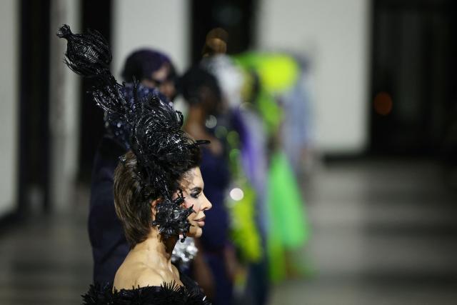 A model presents a creation for Germanier for the Women's Haute Couture Spring/Summer 2026 collection fashion show as part of the Paris Haute Couture Fashion Week, in Paris, on January 29, 2026. (Photo by Thomas SAMSON / AFP)