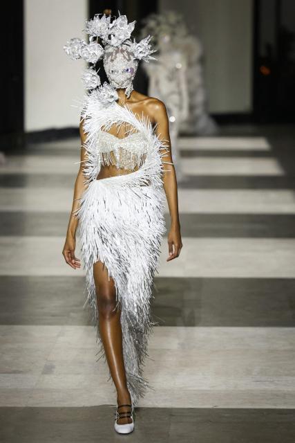 A model presents a creation for Germanier for the Women's Haute Couture Spring/Summer 2026 collection fashion show as part of the Paris Haute Couture Fashion Week, in Paris, on January 29, 2026. (Photo by Thomas SAMSON / AFP)
