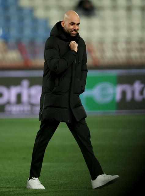 Celta's head coach Claudio Giraldez walks on the pitch ahead of the UEFA Europa League - League phase, Matchday 8 - football match between FK Crvena Zvezda (Red Star Belgrade) and RC Celta de Vigo at the Rajko Mitic Stadium in Belgrade on January 29, 2026. (Photo by Predrag MILOSAVLJEVIC / AFP)
