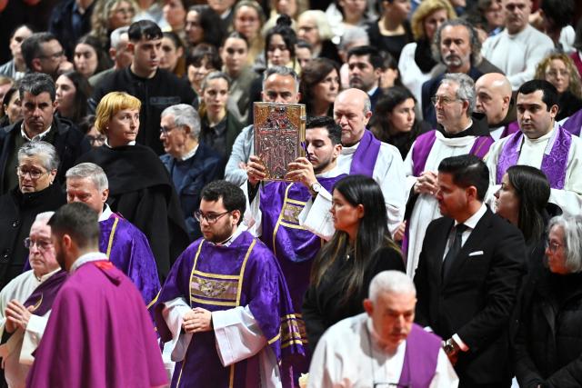 Relatives attend a funeral mass for the victims of the trains accident who killed 45 persons in Adamuz, on January 29, 2026, in Huelva. The January 18 accident near the southern village of Adamuz - one of Europe's deadliest rail disasters this century - has raised questions about the country's rail safety. (Photo by JORGE GUERRERO / AFP)