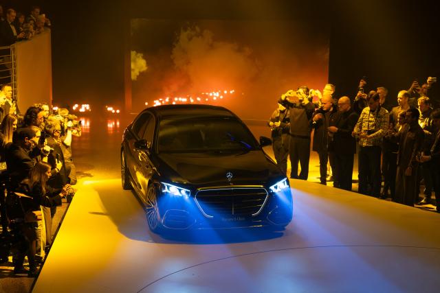 The new Mercedes-Benz S-Class drives on stage at the world premiere and 140 years celebration at the Mercedes-Benz Museum Stuttgart on January 29, 2026. (Photo by Silas Stein / AFP)