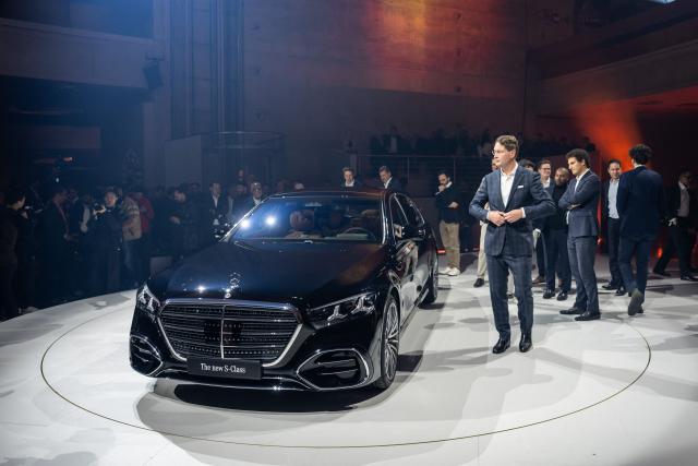 Ola Kaellenius, Chairman of the Board of Management of Mercedes-Benz Group AG stands next to the new Mercedes-Benz S-Class during the World Premiere show of the new Mercedes-Benz S-Class and 140 years celebration at the Mercedes-Benz Museum Stuttgart on January 29, 2026. (Photo by Silas Stein / AFP)