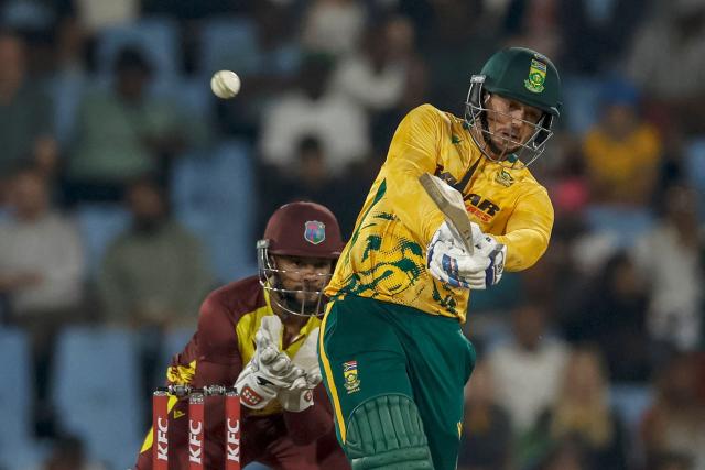 South Africa's Quinton de Kock (R) hits a six during the second Twenty20 international cricket match between South Africa and West Indies at SuperSport Park in Centurion on January 29, 2026. (Photo by PHILL MAGAKOE / AFP)